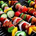 Professionele BBQ op locatie met voordelen zoals tijdsbesparing en sfeervolle presentatie van maaltijden
